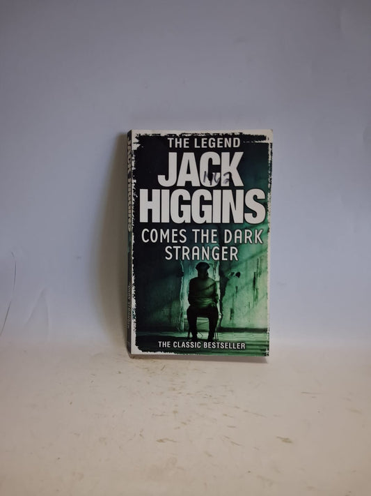 Higgins, Jack - COMES THE DARK STRANGER