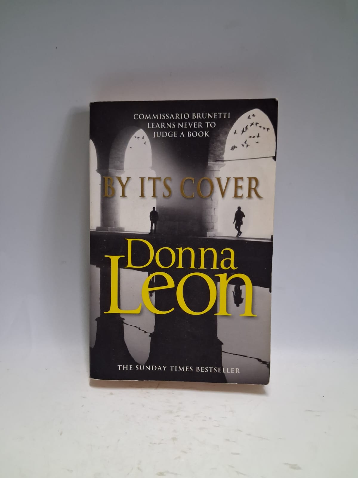 Leon, Donna - BY ITS COVER